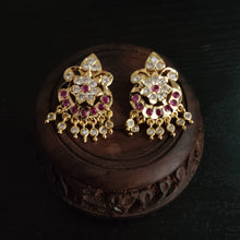 Impon earrings with red and clear gemstones