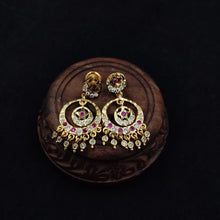 Impon earrings with gemstones