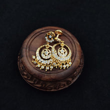 Impon earrings with gemstones