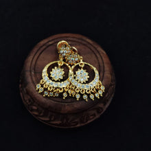 Impon earrings with gemstones