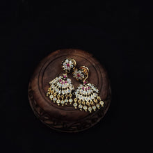 Impon Ornate gold earrings with gemstones