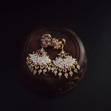 Impon Ornate gold earrings with gemstones