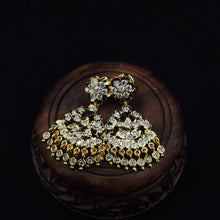 Impon Ornate gold earrings with gemstones