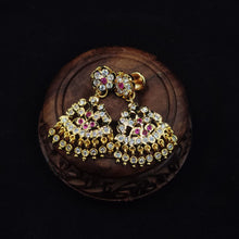 Impon Ornate gold earrings with gemstones