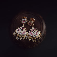 Impon Ornate gold earrings with gemstones