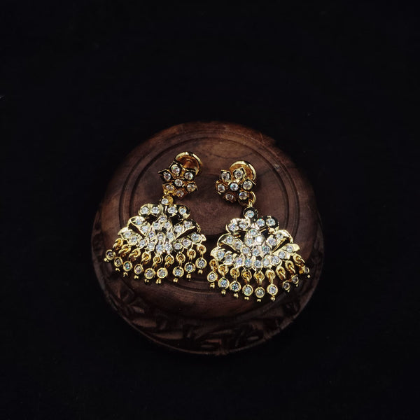 impon earrings with gemstones