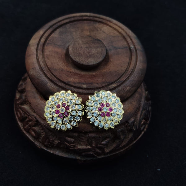Impon ornate earrings with gemstones