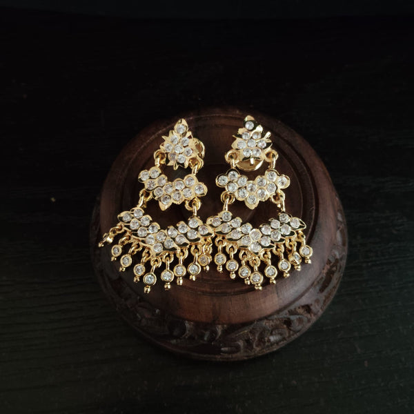 Impon Ornate gold earrings with gemstones