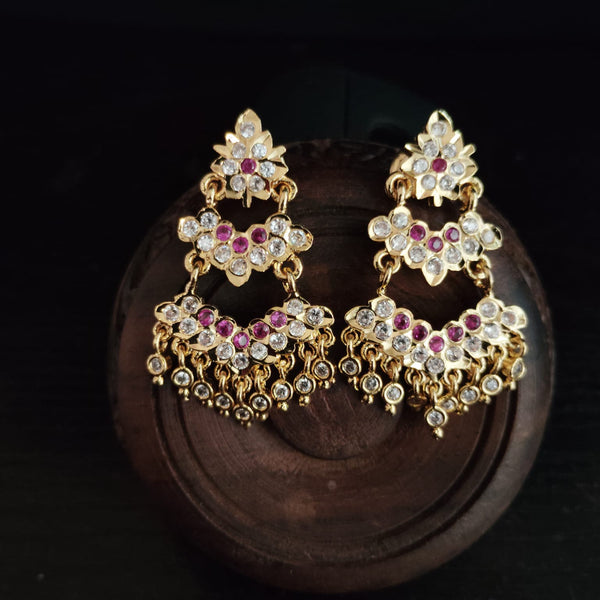 Impon Ornate gold earrings with gemstones