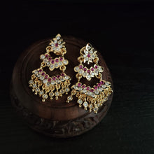 Impon Ornate gold earrings with gemstones