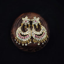Ornate impon earrings with gemstones