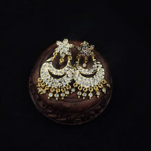 Ornate impon earrings with gemstones