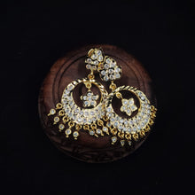Ornate impon earrings with gemstones