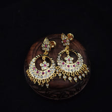 Ornate impon earrings with gemstones