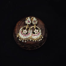 Ornate impon earrings with gemstones