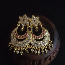 impon earrings with full gemstones