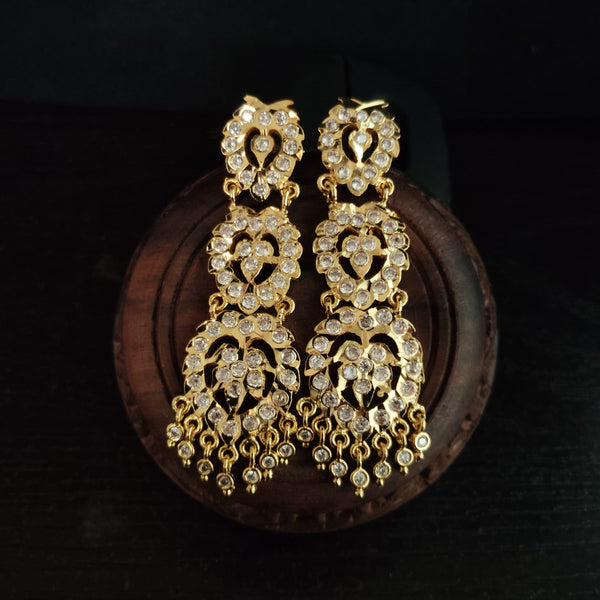 impon earrings with gemstones