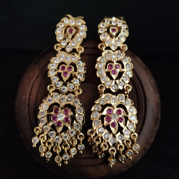 impon earrings with gemstones